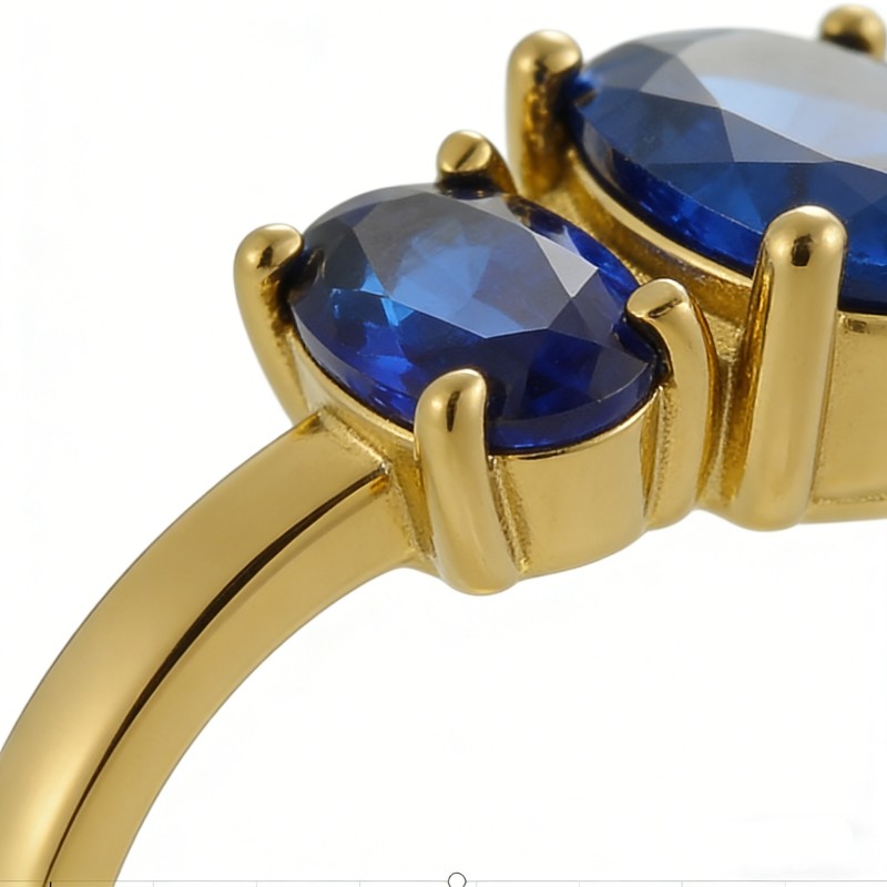 PVD 14K Gold High Polish 316L Stainless Steel & ring adorned with vibrant blue zircon